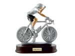 Resine cyclisme femme h.21x24cm